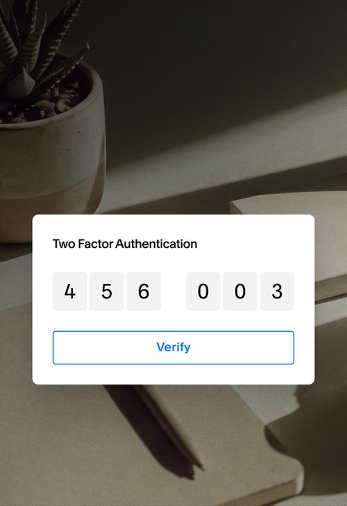 An image that features the UI with a two-factor authentication prompt asking for a code sent to the user