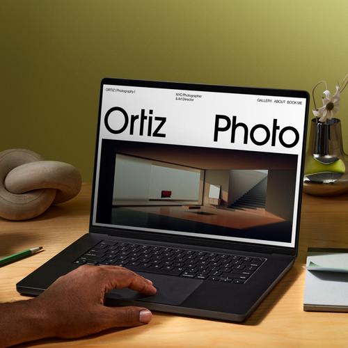 Laptop with Ortiz Photo website open