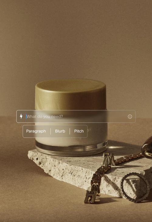 User interface with writing prompt over a close-up photo of a stone slab holding a ceramic container, chain, and ring. Includes buttons "Simplify," "Shorten," "Lengthen," and an AI search bar. Below, options like "Write a title about..." and "Craft a persuasive argument about..." appear on a semi-transparent overlay.