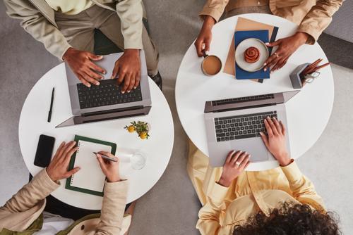 Hand holding pad of paper