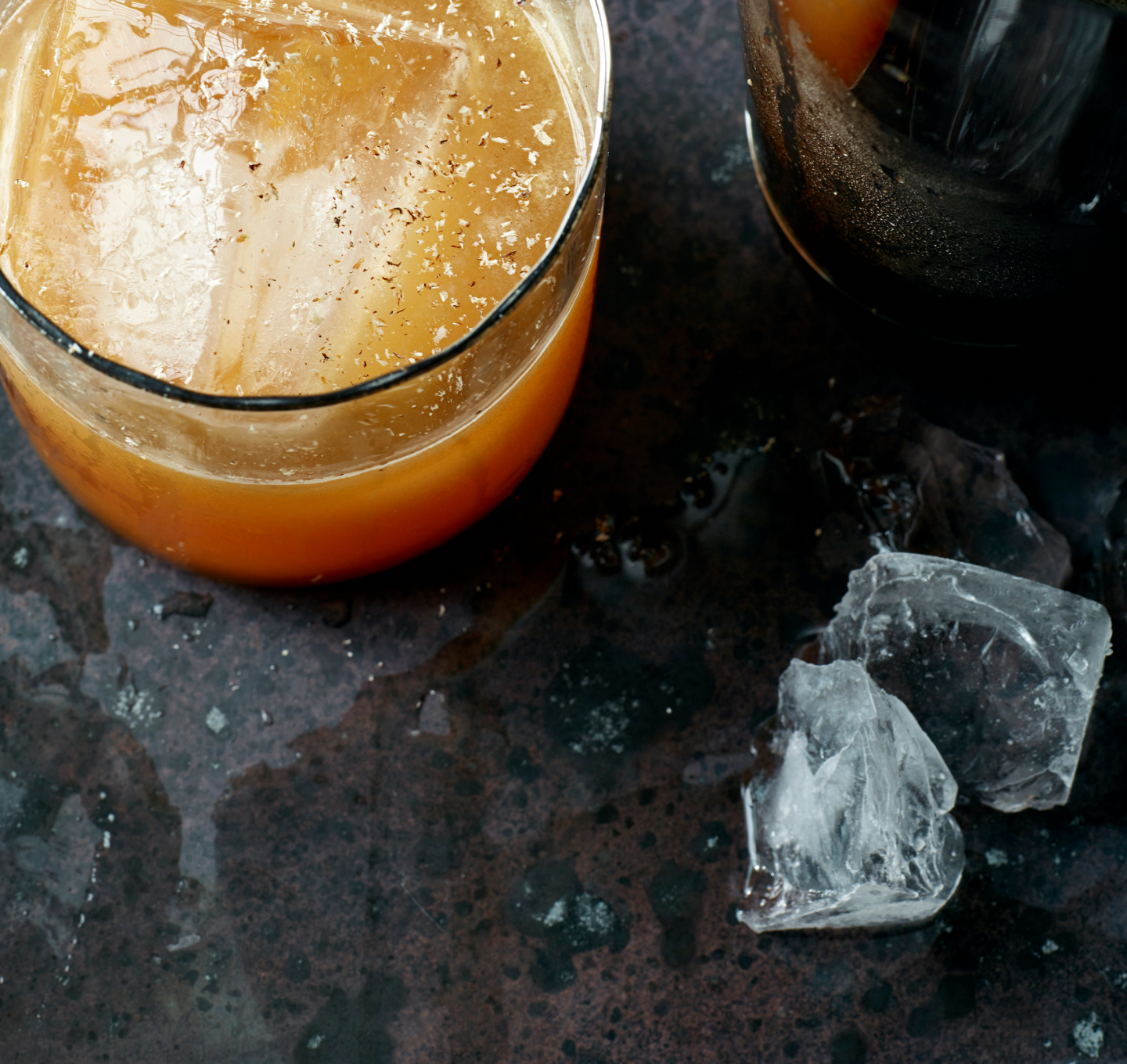 Cocktail and ice on a table